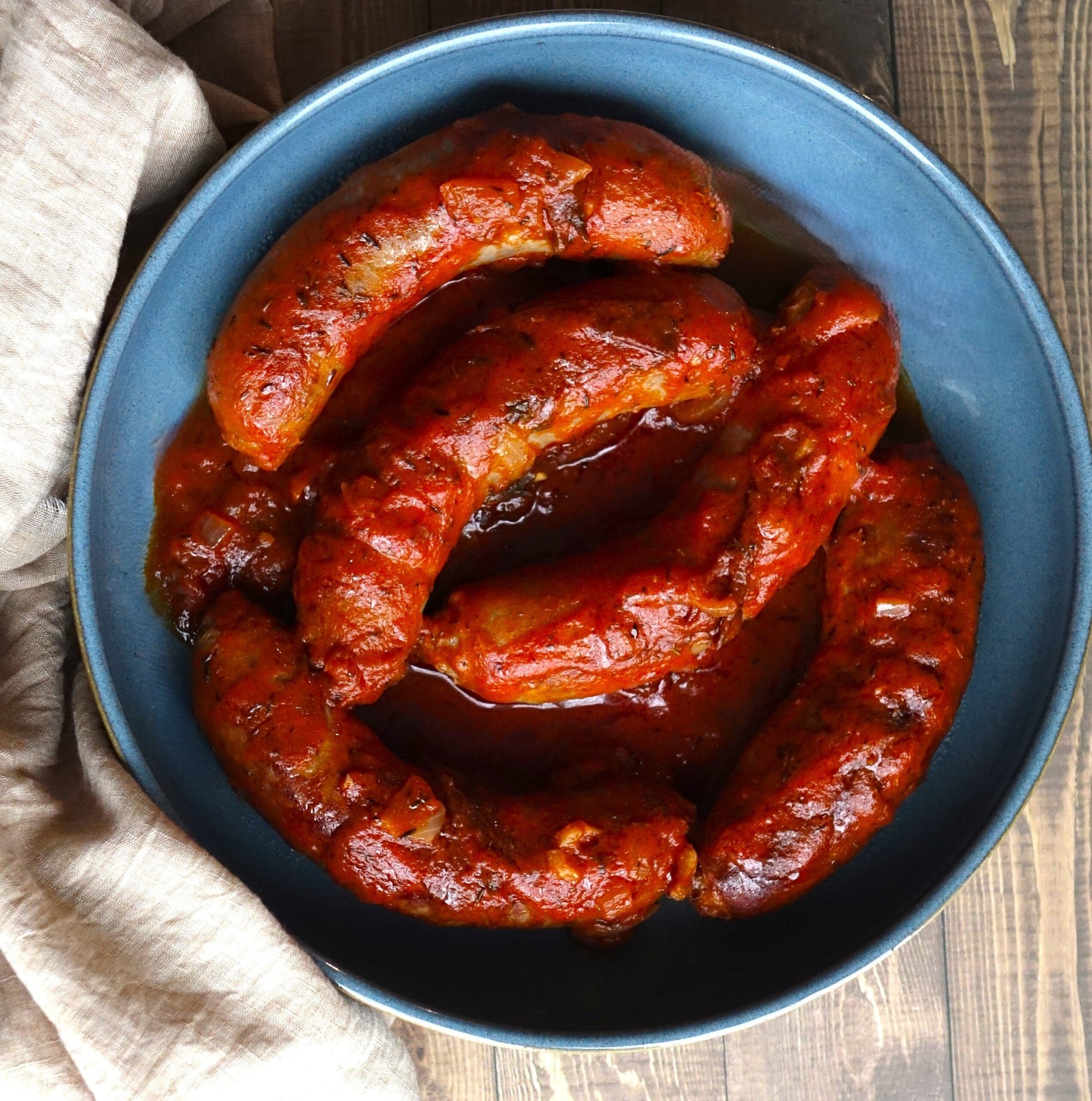 italian sausages with tomato sauce.png